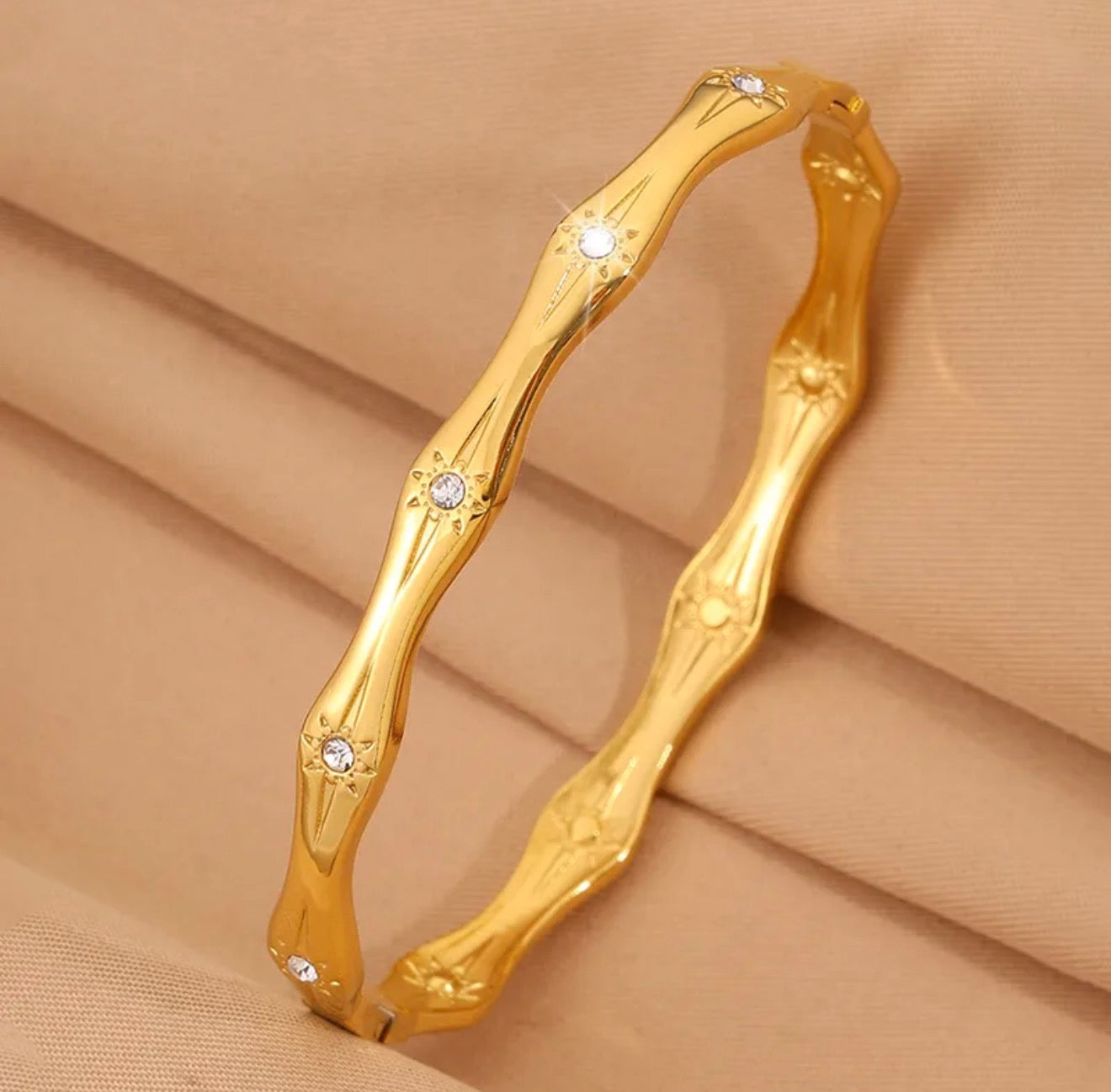 Mehbir Wave Glow Crystal bangle 18k gold plated stainless