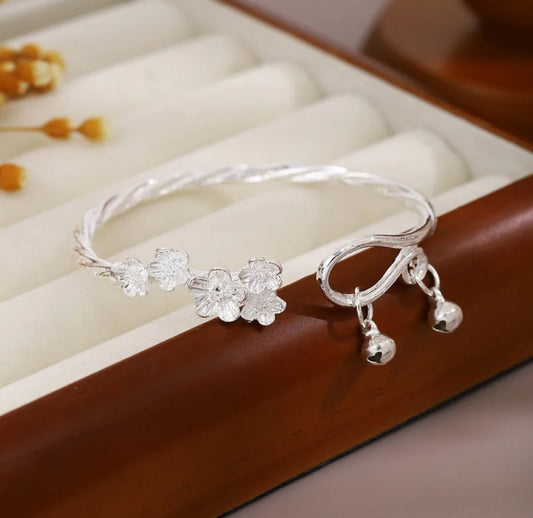Elegant Floral Silver Bracelet with Bell Charms