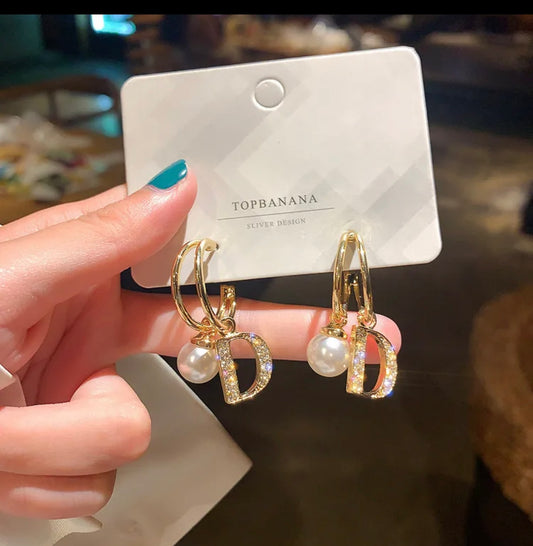 Dior pearl shine earrings