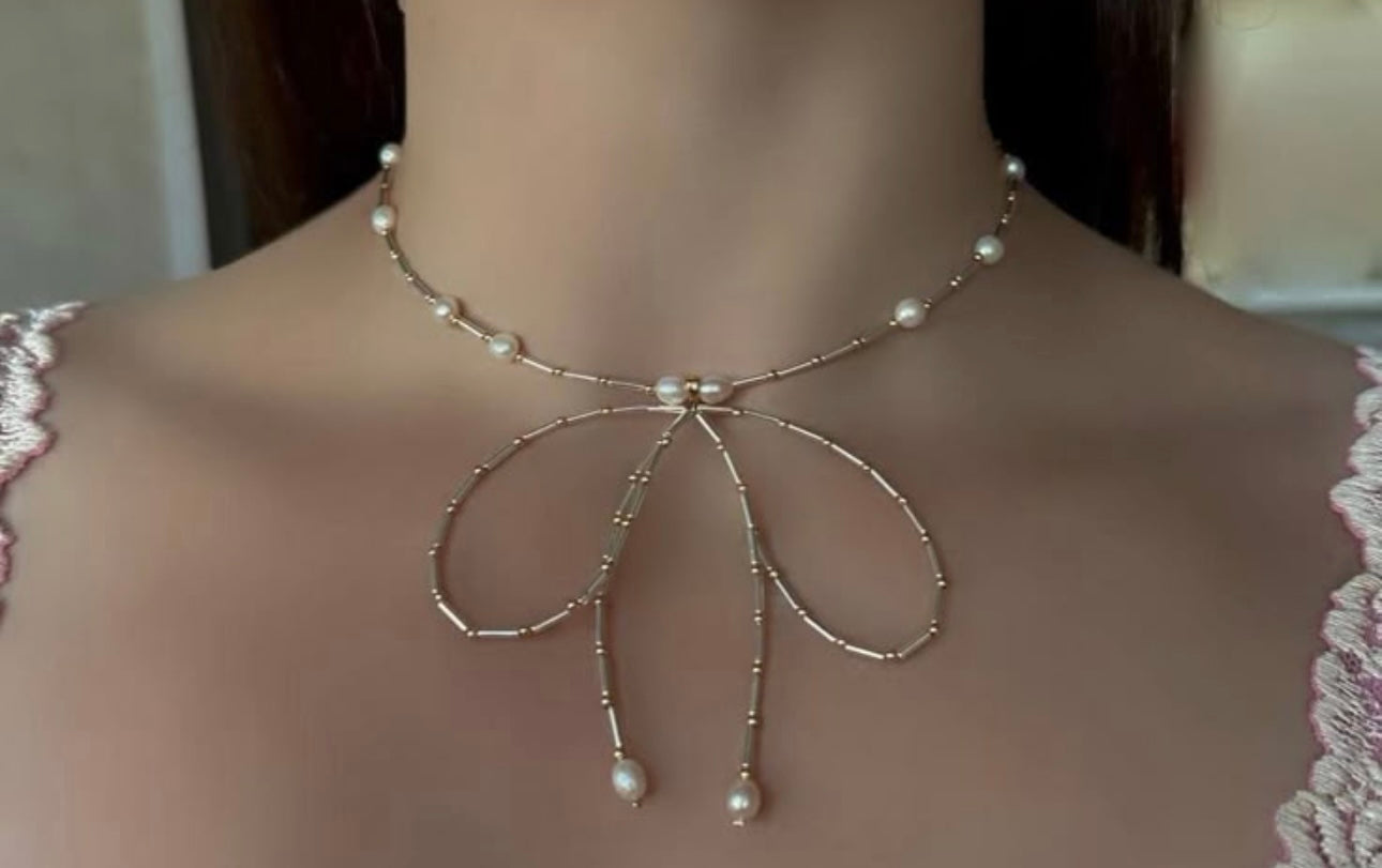 Gold beaded bow
