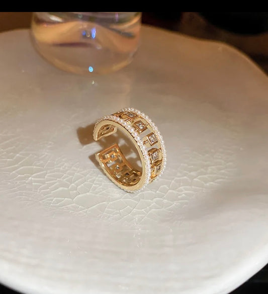 Gold Open Band Ring with Geometric Cutouts and Crystal Accents