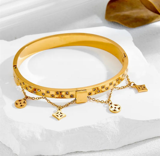 Gold Plated Bangle with Dangling Charms and Crystal Accents
