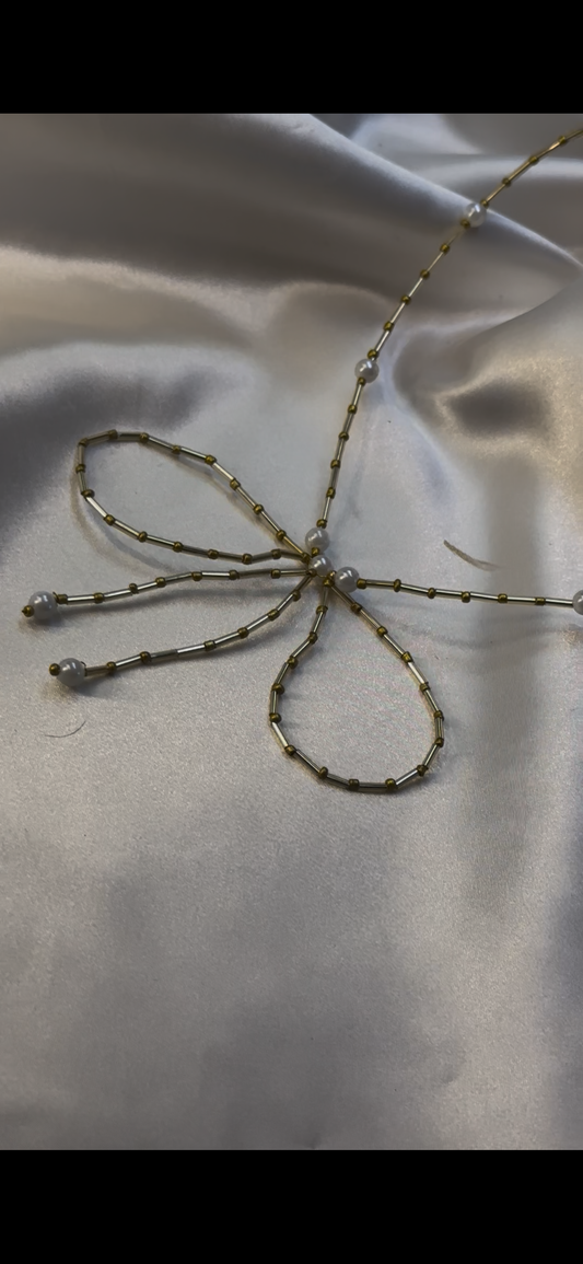 Gold beaded bow